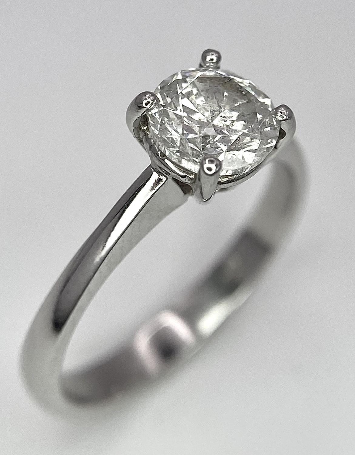 A Platinum Diamond Solitaire Ring. Size L. 4.1g total weight.