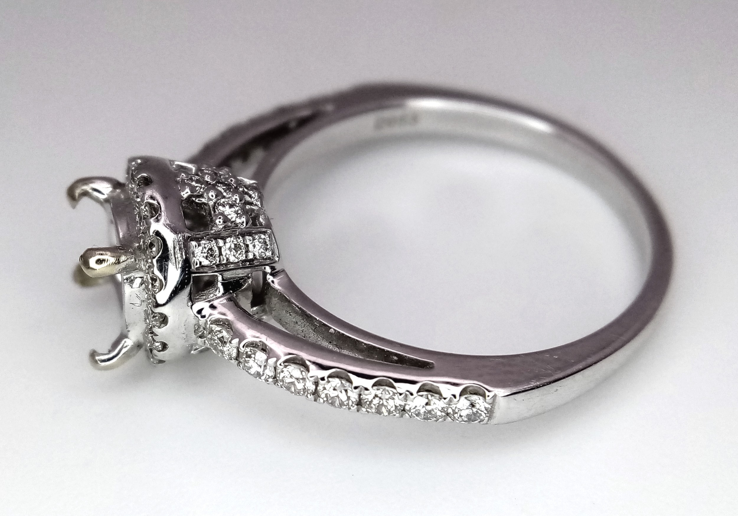 AN 18K WHITE GOLD DIAMOND HALO SOLITAIRE RING MOUNT WITH DIAMOND SET SHOULDERS. Ready to set your - Image 7 of 8