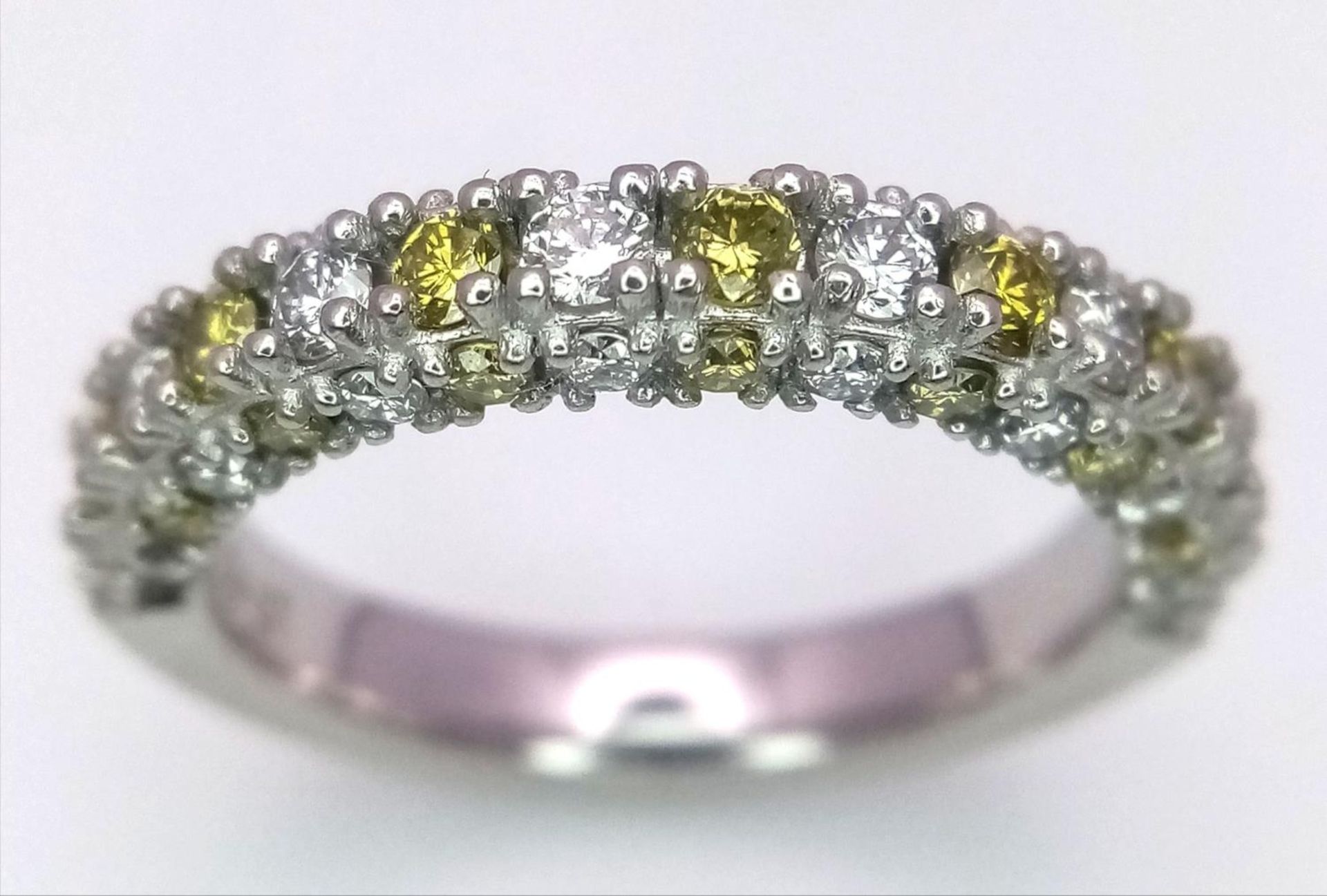 A Platinum White and Yellow Diamond Three-Sided Half Eternity Ring. Size L. 6.3g total weight. - Bild 2 aus 9