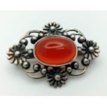 A Vintage or Antique Silver Carnelian Cabochon Brooch. 3.5cm Width. Set with a 1.5cm Oval Cut