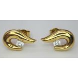 A Pair of 9K Yellow Gold Abstract White Stone Earrings. 1.8g weight.