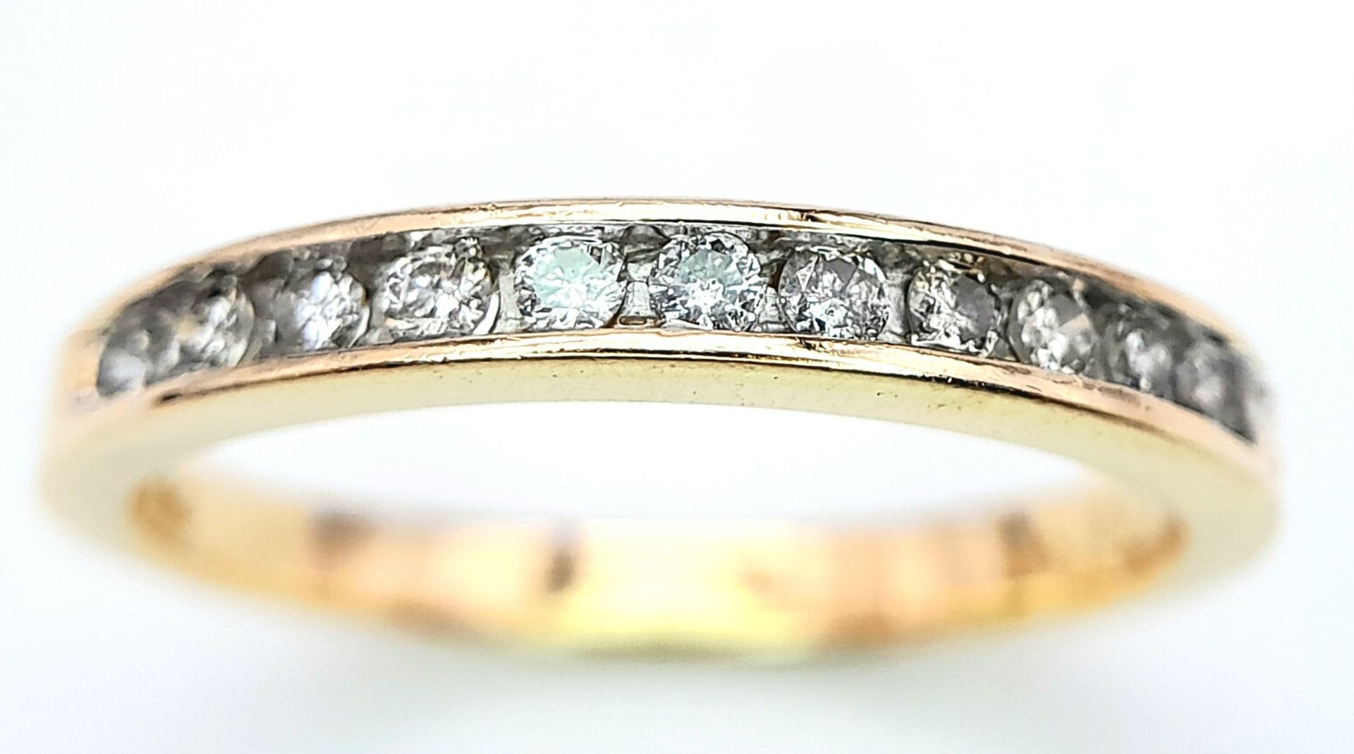 A 14K YELLOW GOLD DIAMOND HALF ETERNITY RING. 0.25ctw, Size N, 2.4g total weight. Ref: SC 8049 - Image 4 of 6