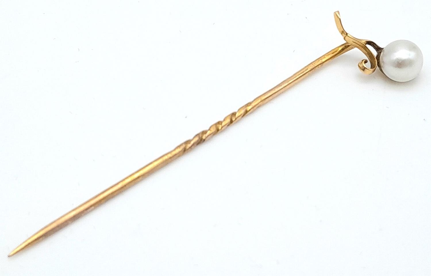 A Vintage 9K (tested) Yellow Gold Stick Pin with Pearl Decoration. 5.5cm. 1g total weight.