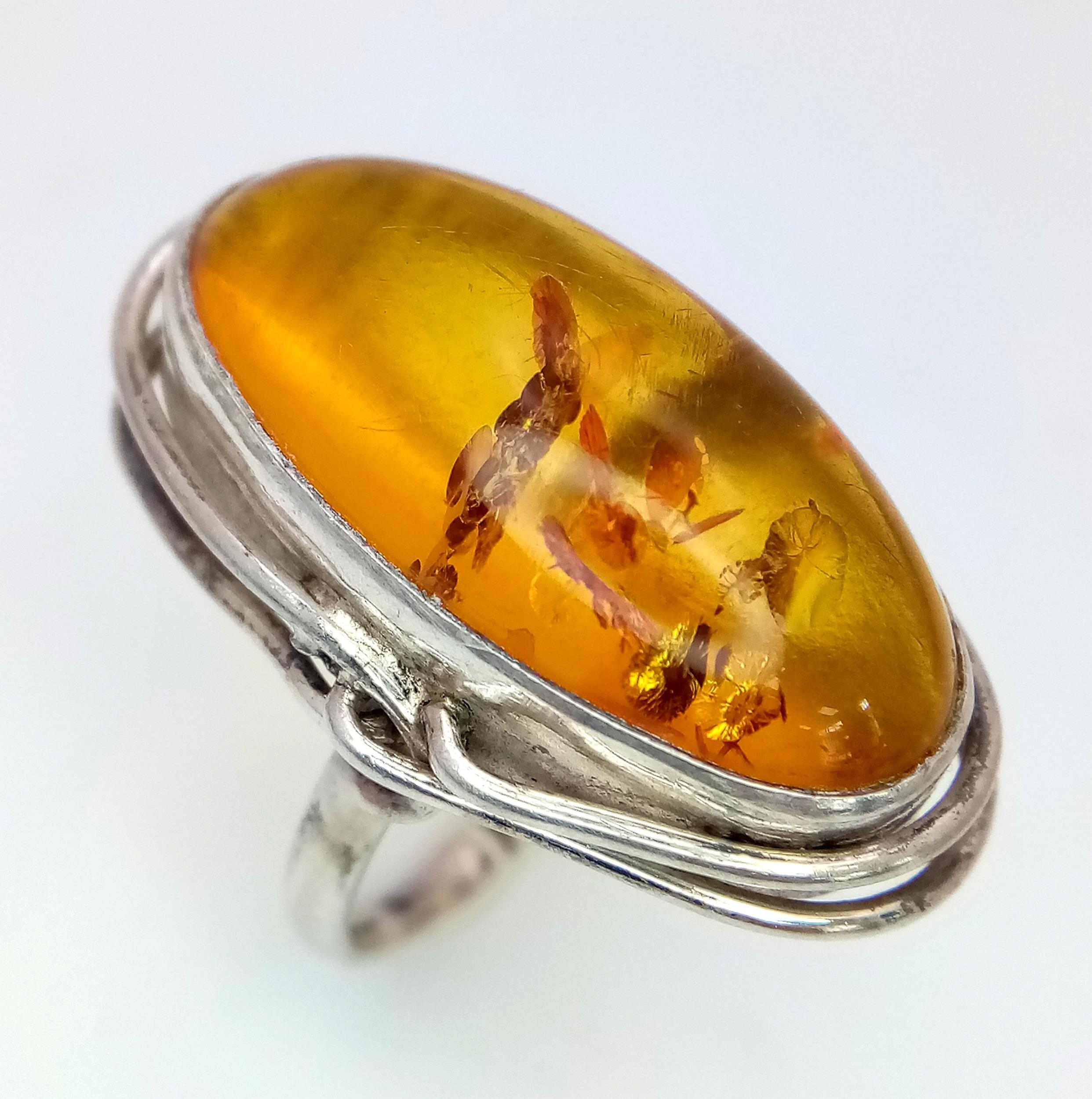 A Vintage, Ornate Mounted, Sterling Silver Amber Cabochon Open Shank Design Ring Size L (