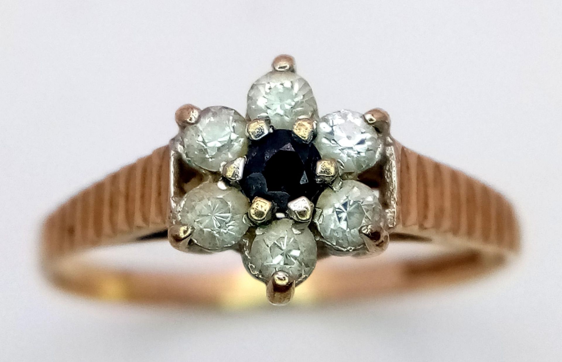 A Vintage 9K Yellow Gold Sapphire and White Zircon Ring. Size L. 1.2g total weight. - Image 2 of 6