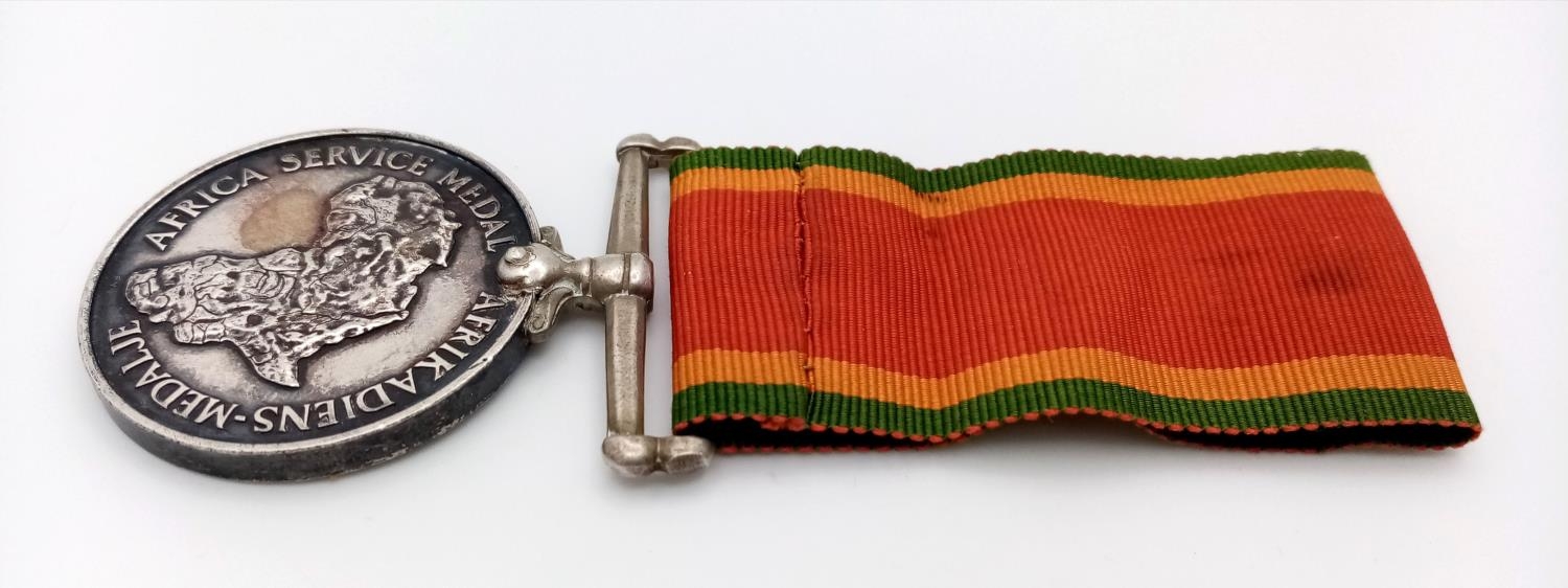 An African Service Medal with Ribbon - Awarded to J.W. Minogue. - Image 2 of 3