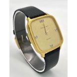 A Girard Perregaux Gold Plated Gyromatic Gents Watch. Black leather strap. Gold plated case -