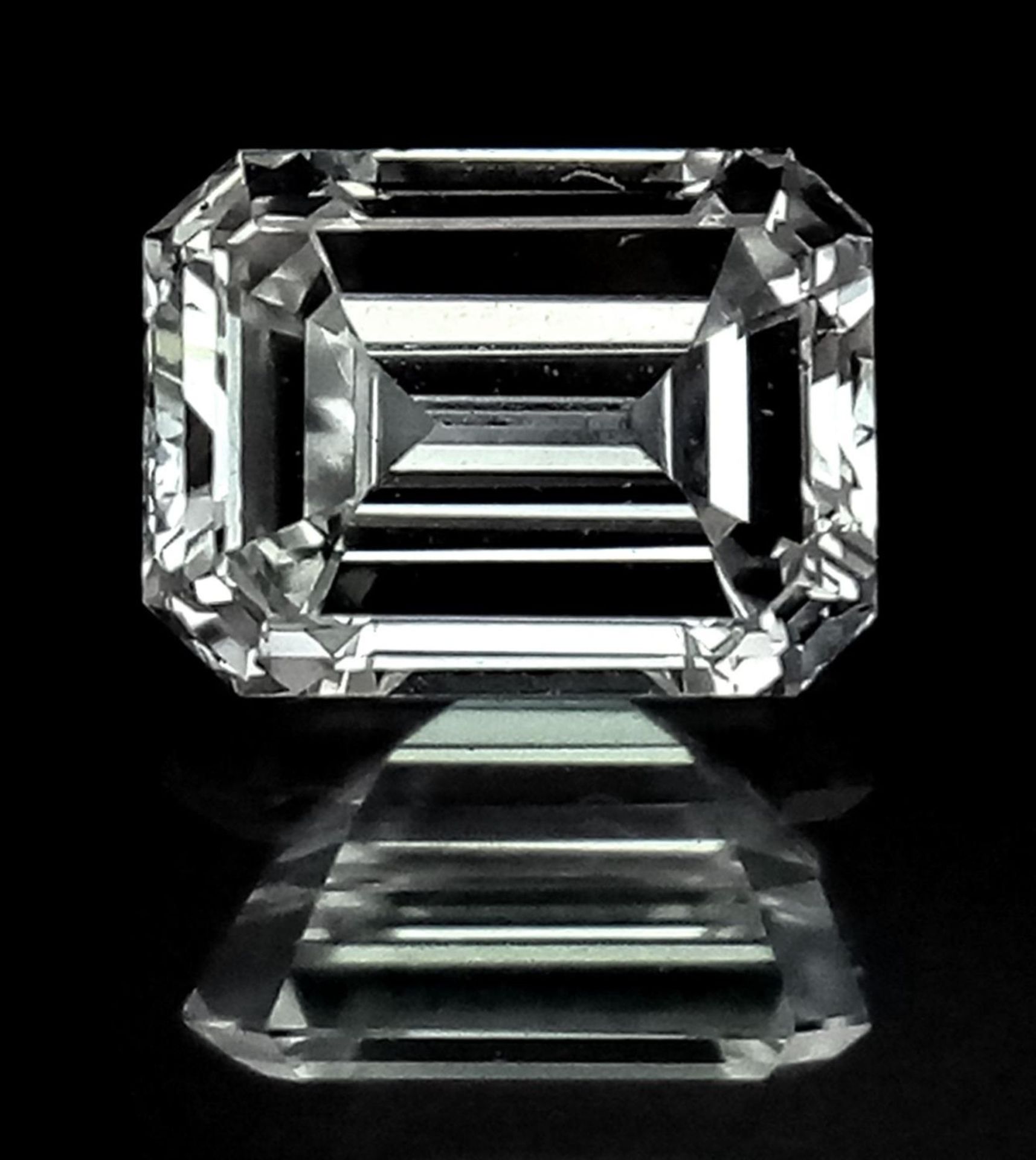 A 0.725ct Emerald Cut Diamond. VVS2 clarity. H colour. Comes with a DIA certificate.