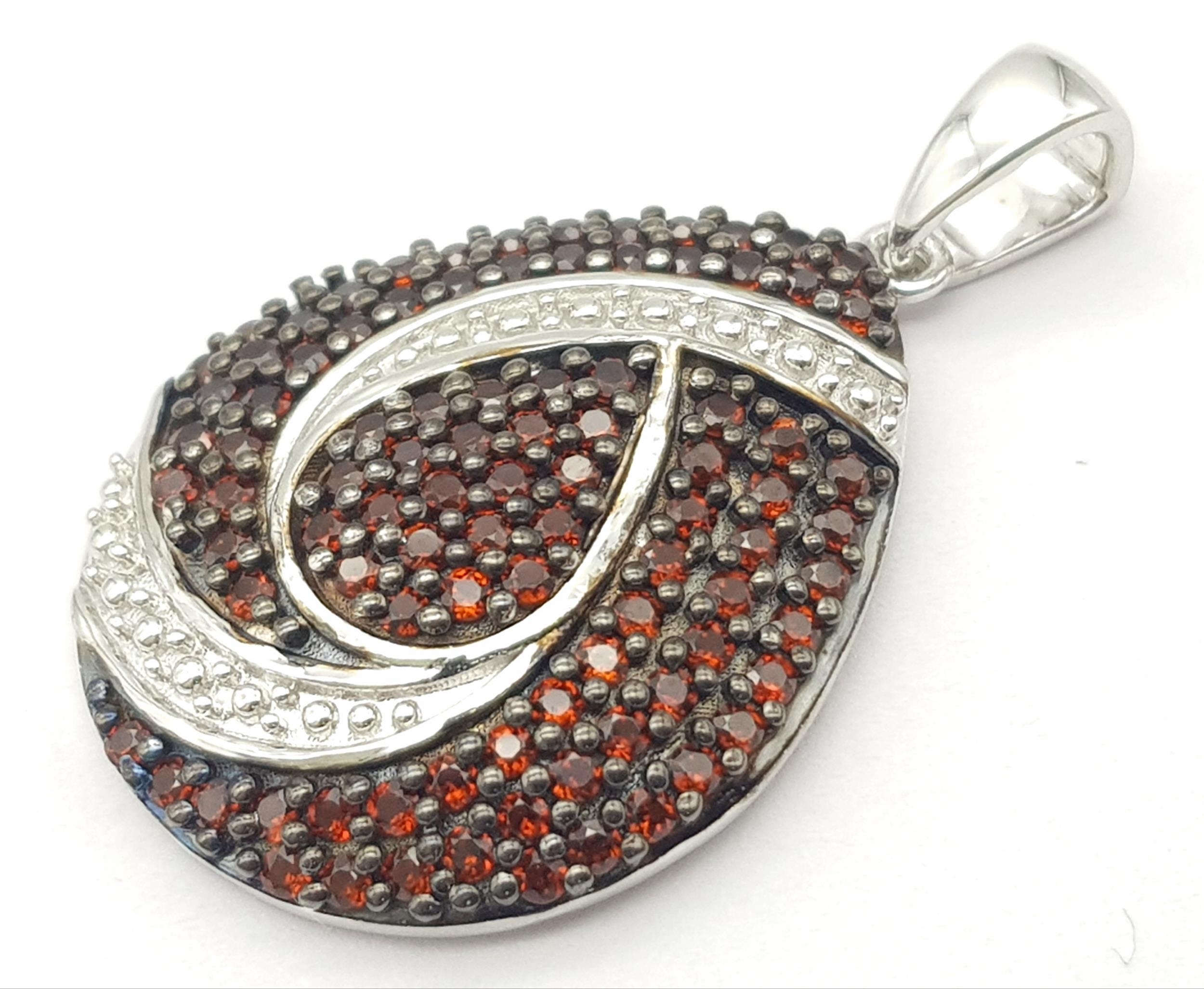 An Unworn, Fully Certified Limited Edition (1 of 50), Sterling Silver and Anthill Garnet Pendant.