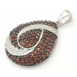 An Unworn, Fully Certified Limited Edition (1 of 50), Sterling Silver and Anthill Garnet Pendant.