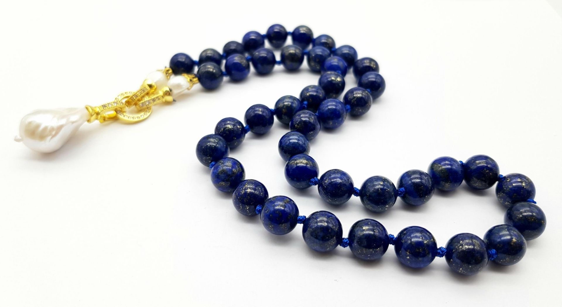 A Lapis Lazuli Beaded Necklace with Baroque Pearl Pendant. 10mm beads. Pendant - 6cm. Necklace - Image 4 of 4