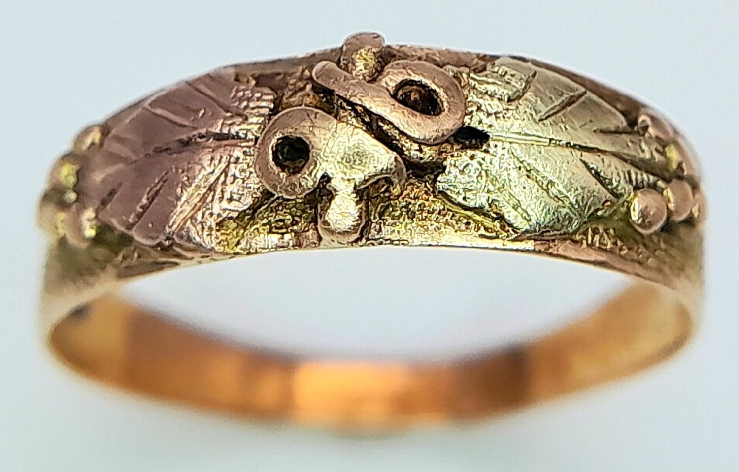 An Antique 14K Tri-Coloured Gold Black Hills Ring. 0.76g weight.