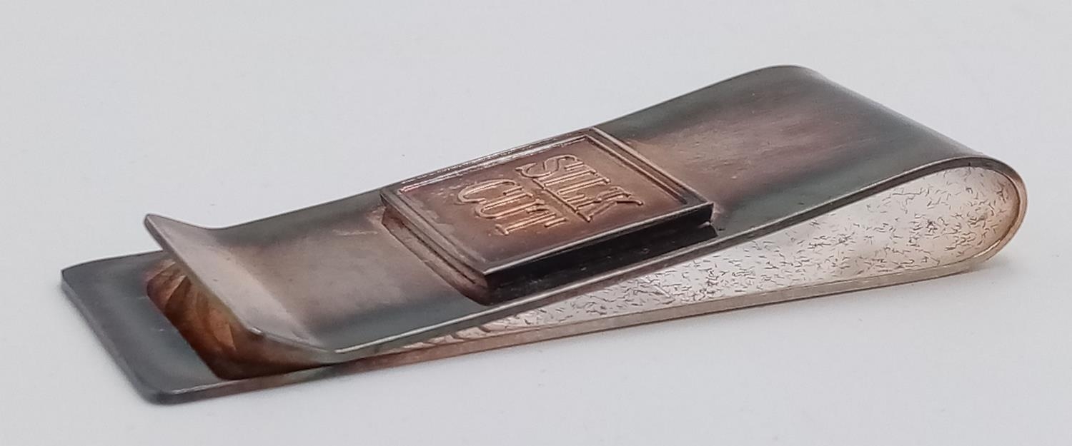 A SILK CUT SILVER TONE MONEY CLIP IN BOX 27.8g , 60mm x 23mm. ref:CHALK 9001 - Image 4 of 4