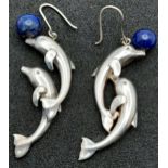 A Pair of Sterling Silver Lapis Lazuli Leaping Dolphin Earrings. 5.5cm Length.