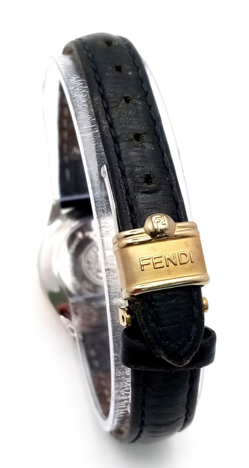 A Fendi Designer Quartz Ladies Watch. Black leather strap. Gilded circular case - 26mm. In working - Image 5 of 7