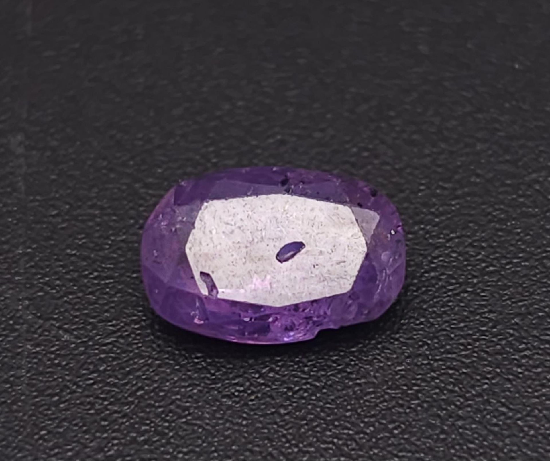 A 1.81ct Rare Untreated Kashmir Pink Violet Sapphire - GFCO Swiss Certified.