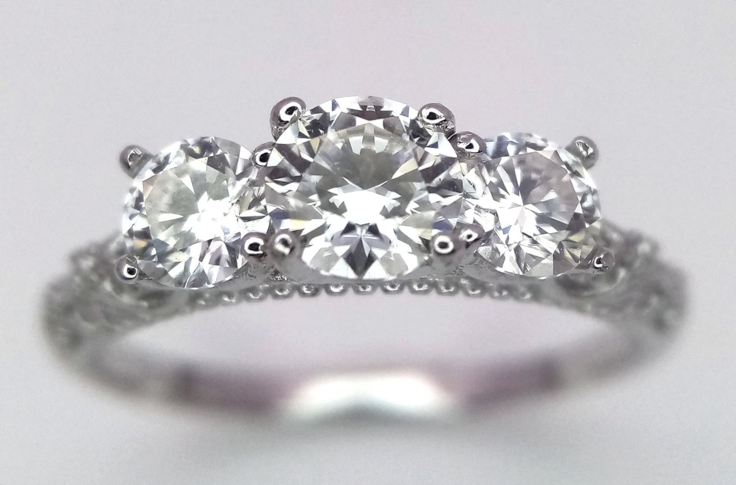A 0.5ct Three Stone Moissanite, 925 Silver Ring. Size N. Comes with a GRA cert. - Image 2 of 6