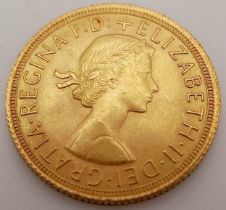 A 1964 22K Gold Queen Elizabeth II Full Sovereign Coin.