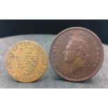 An 1826 Penny and a George III 1797 Token.
