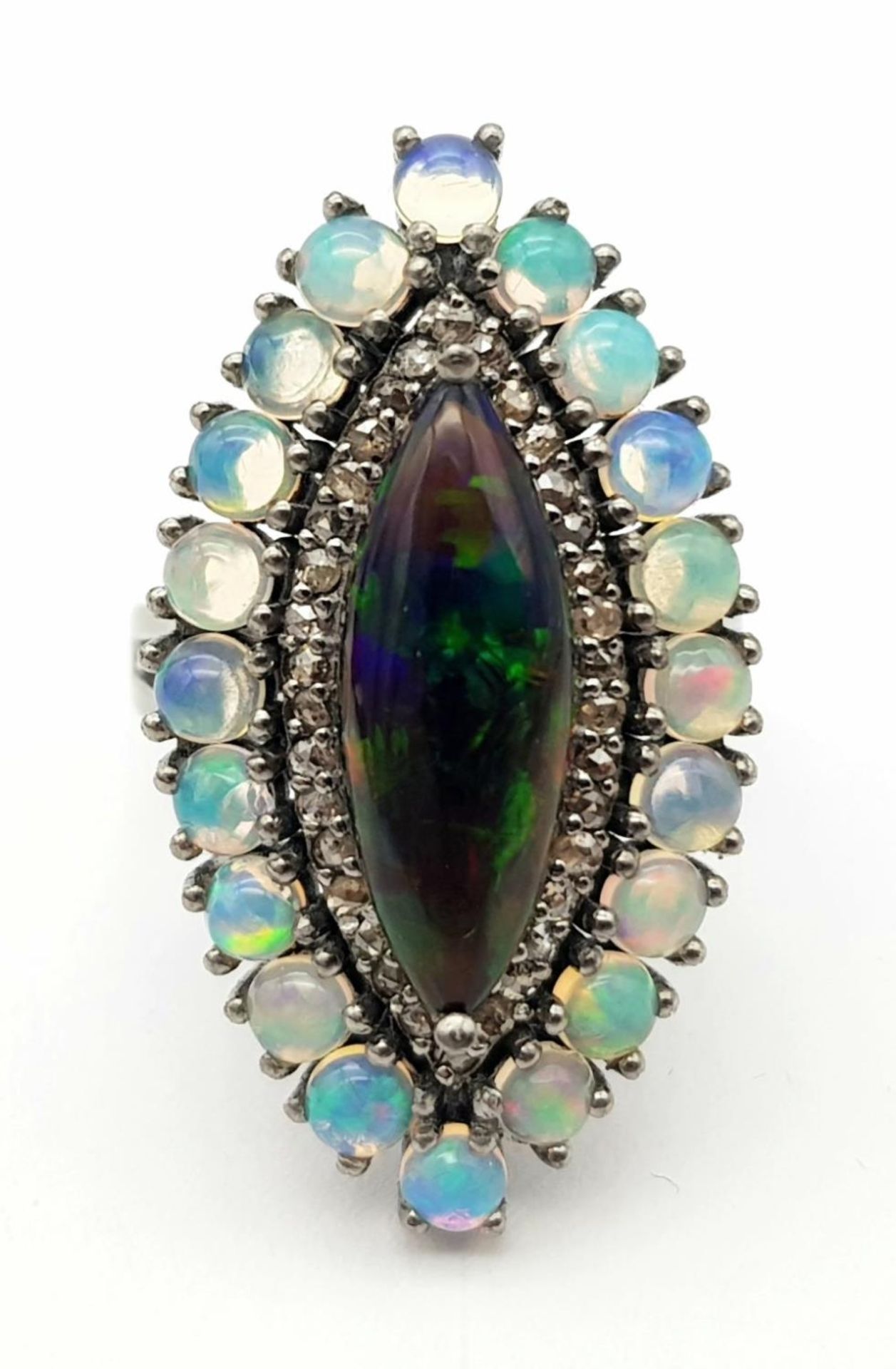 A 2ct Black Opal Marquise Shaped Ring with 1.80ctw White opal surround and .40ctw of Diamond - Image 3 of 6