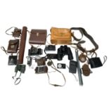 A Vintage Collection of Cameras, Camera Accessories and Binoculars. As found