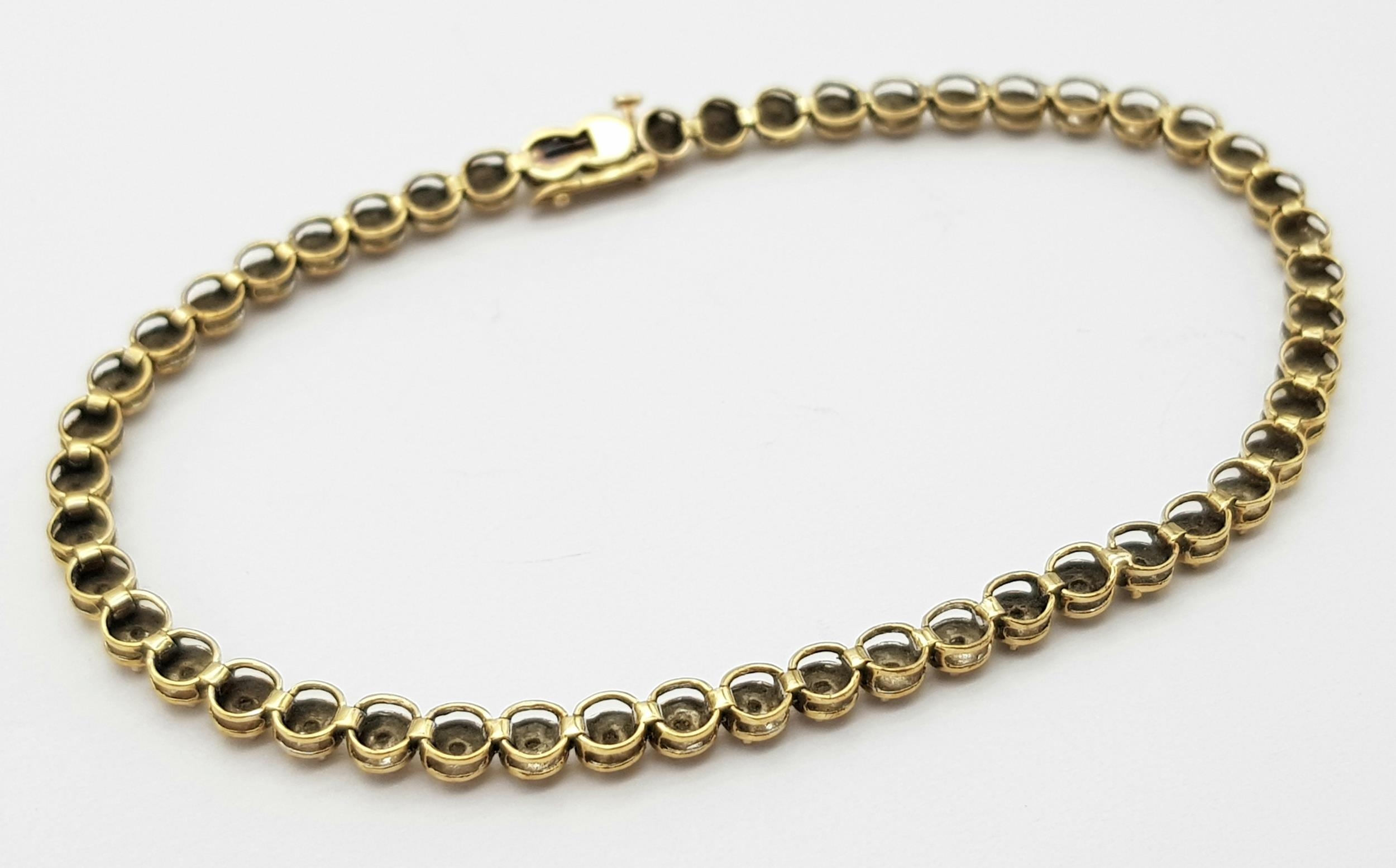 A Vintage 9K Yellow Gold Diamond Tennis Bracelet. 19cm. 5.8g total weight. - Bild 2 aus 7