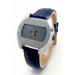 A Vintage Ingersoll Jump Watch. Blue leather strap. Stainless steel case - 38mm. Metallic grey