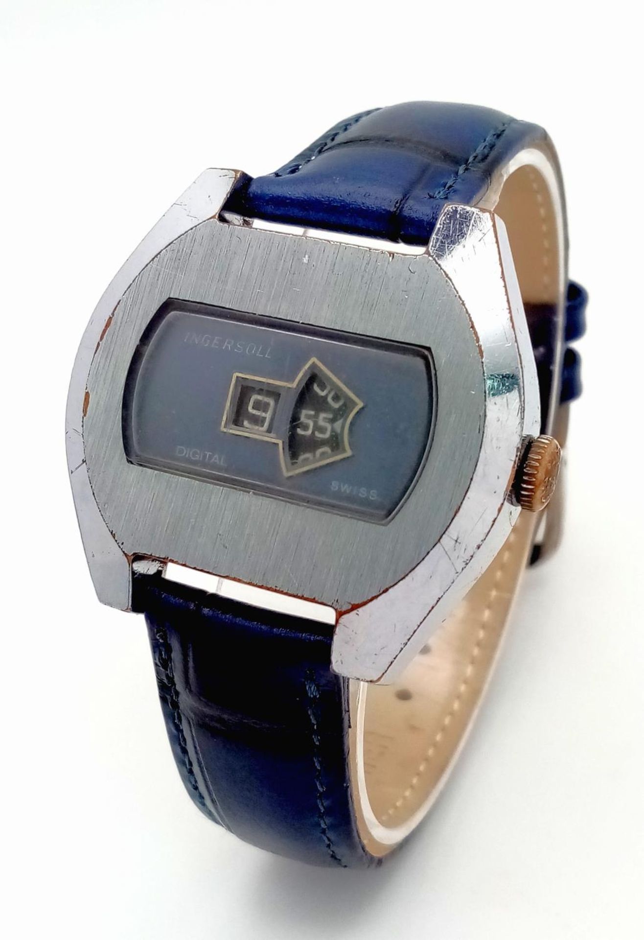 A Vintage Ingersoll Jump Watch. Blue leather strap. Stainless steel case - 38mm. Metallic grey