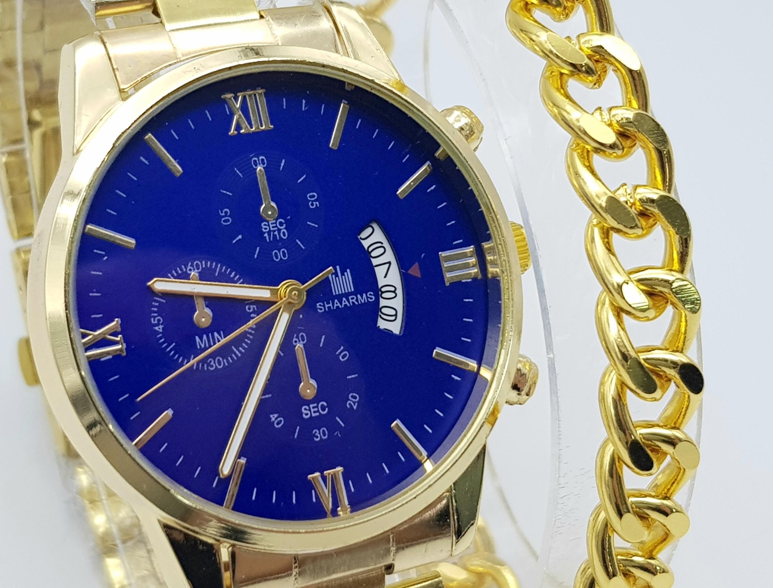 A gold plated Shaarms gents watch accompanied by a gent’s gold plated chain bracelet. Watch has a 42 - Image 2 of 4