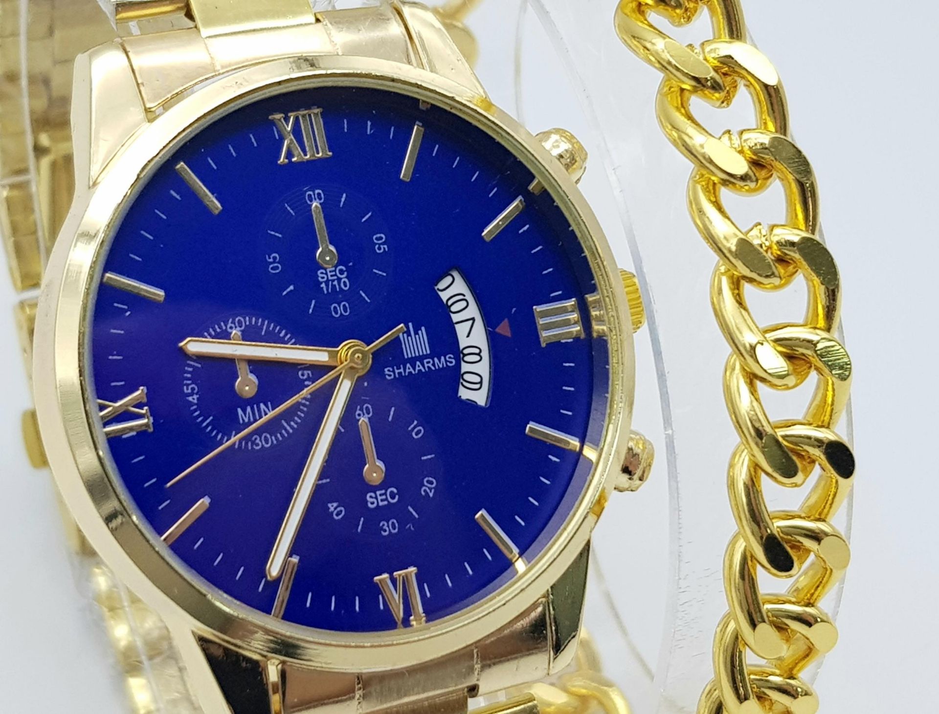 A gold plated Shaarms gents watch accompanied by a gent’s gold plated chain bracelet. Watch has a 42 - Bild 2 aus 4