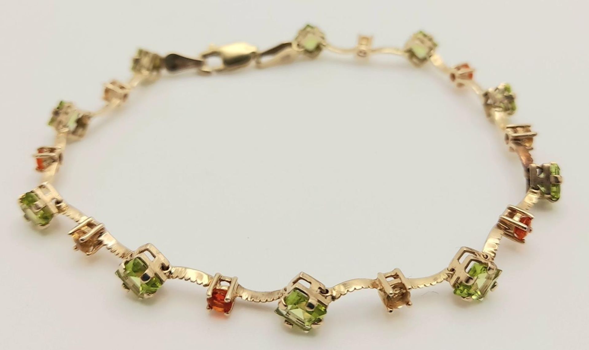 A 14K YELLOW GOLD STONE SET BRACELET 4.3G , 18.3cm length. SC 9028