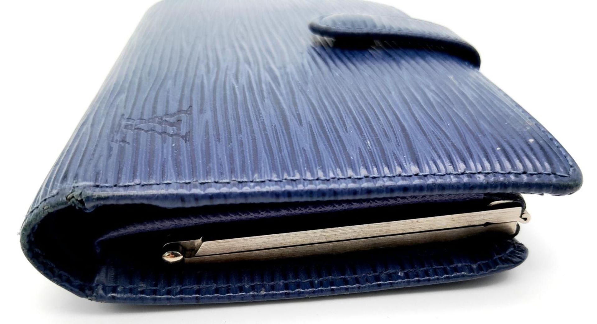 A Vintage Louis Vuitton Blue Bifold Wallet. Epi leather exterior with silver-toned hardware and - Image 5 of 17