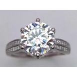 A 3ct Moissanite Ring set in 925 Silver. Size P. Comes with a GRA certificate.