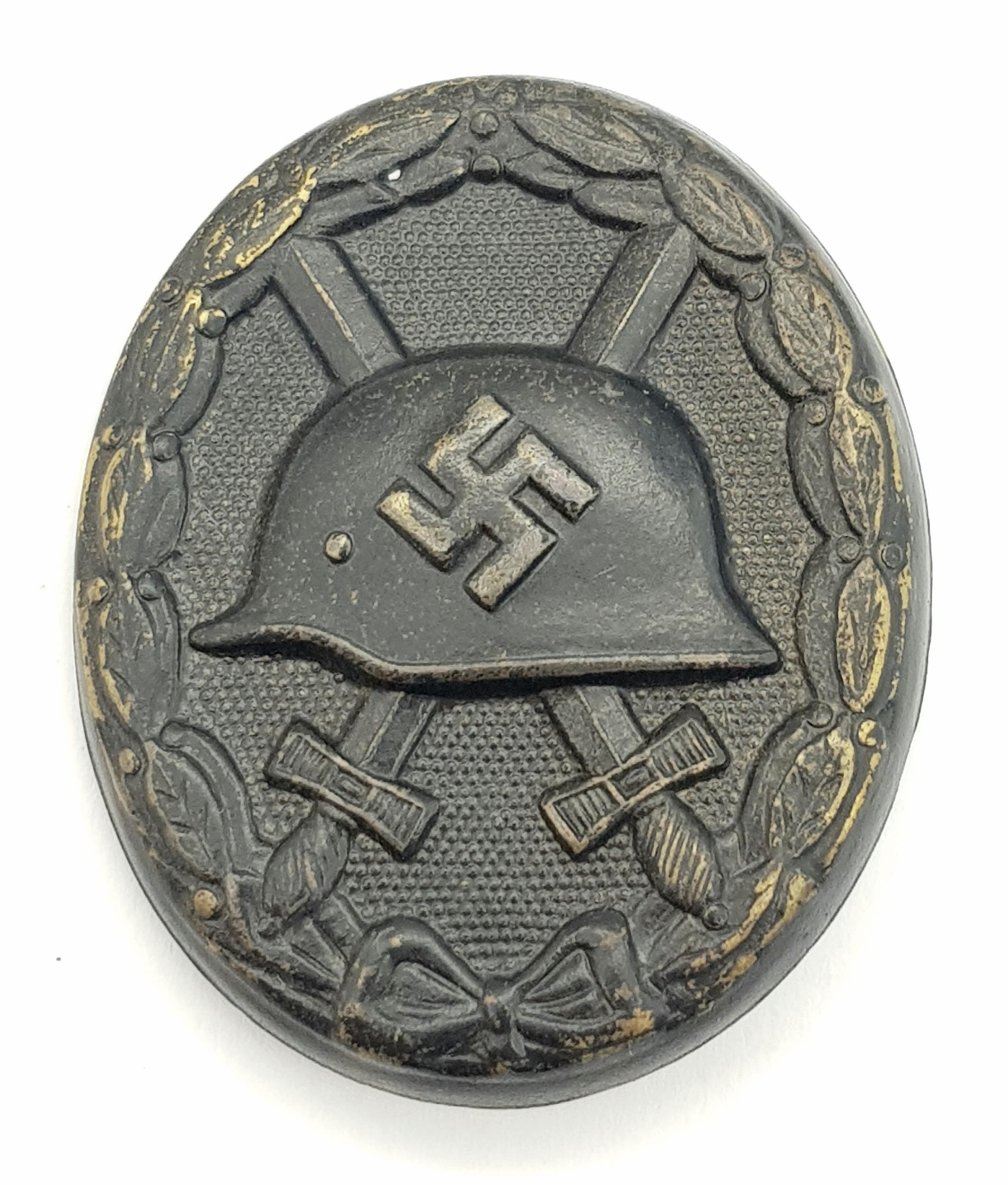 WW2 German 3 rd Class Wound Badge in Black Representing Iron & Award Certificate to a soldier in the