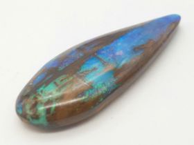 A spectacular and rarely seen in such quality and size opalised fossil wood with wonderful blue