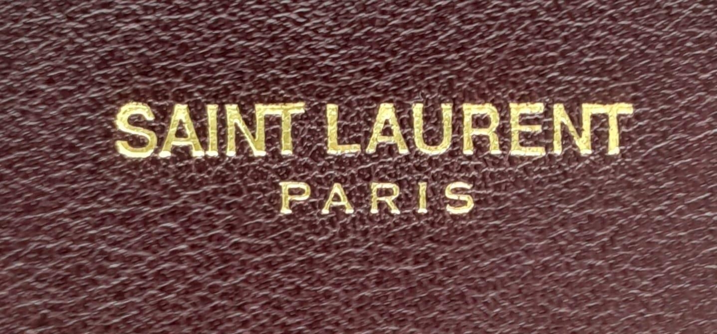 A Saint Laurent Sac De Jour Burgundy Handbag. Leather Exterior, Gold Tone Hardware, Double Handle in - Image 7 of 9