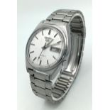 A Vintage Seiko 5 Automatic Gents Watch. Stainless steel bracelet and case - 37mm. Silver tone