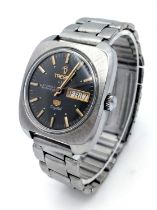 A Vintage Tressa Lux Automatic Gents Watch. Stainless steel bracelet and case - 36mm. Grey dial with