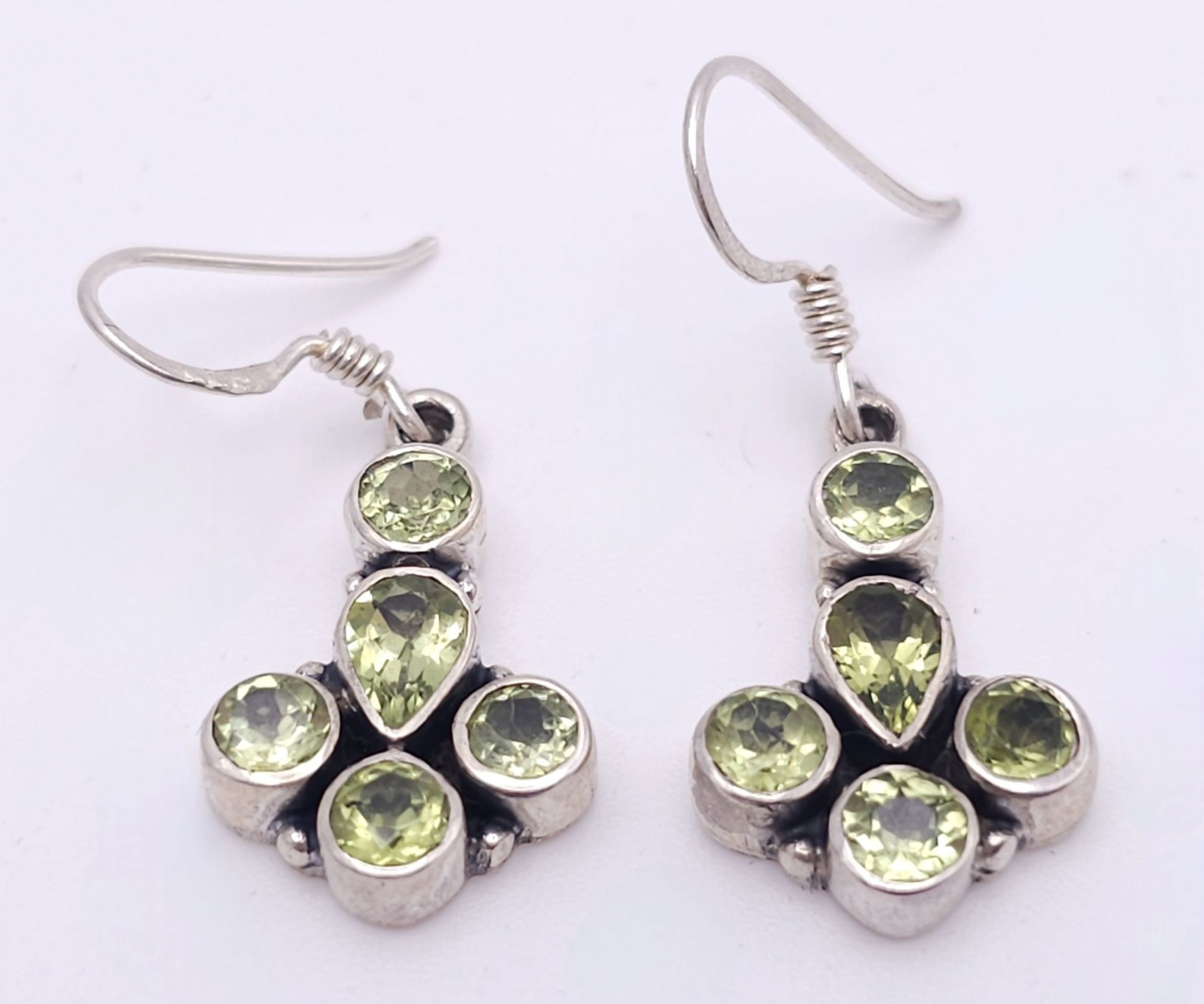 A Pair of Sterling Silver Art Deco Style Peridot Set Earrings. 3cm Drop.