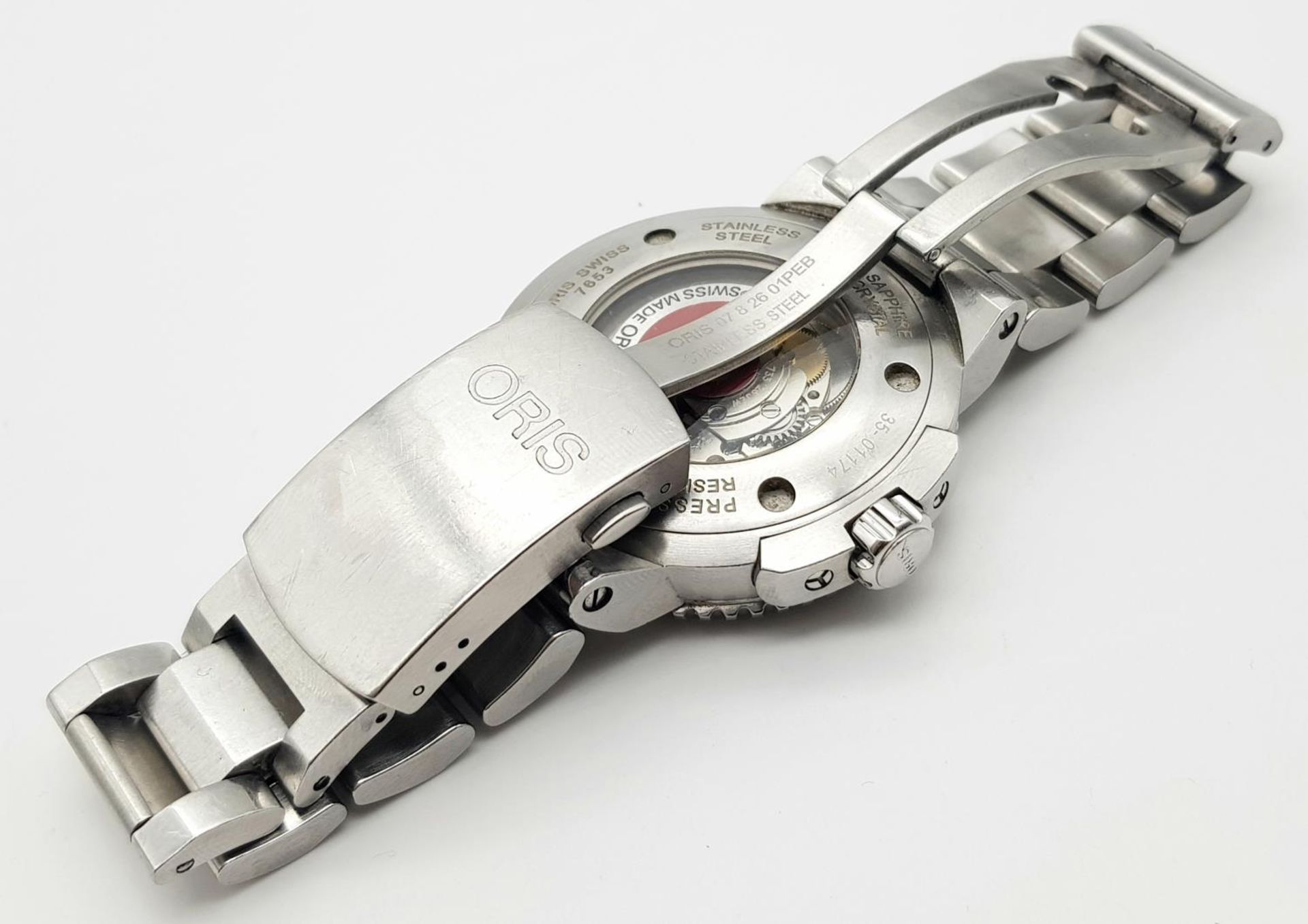 An Oris Automatic Divers Watch. Pressure resistant to 300M - Model 7653. Stainless steel bracelet - Bild 6 aus 8