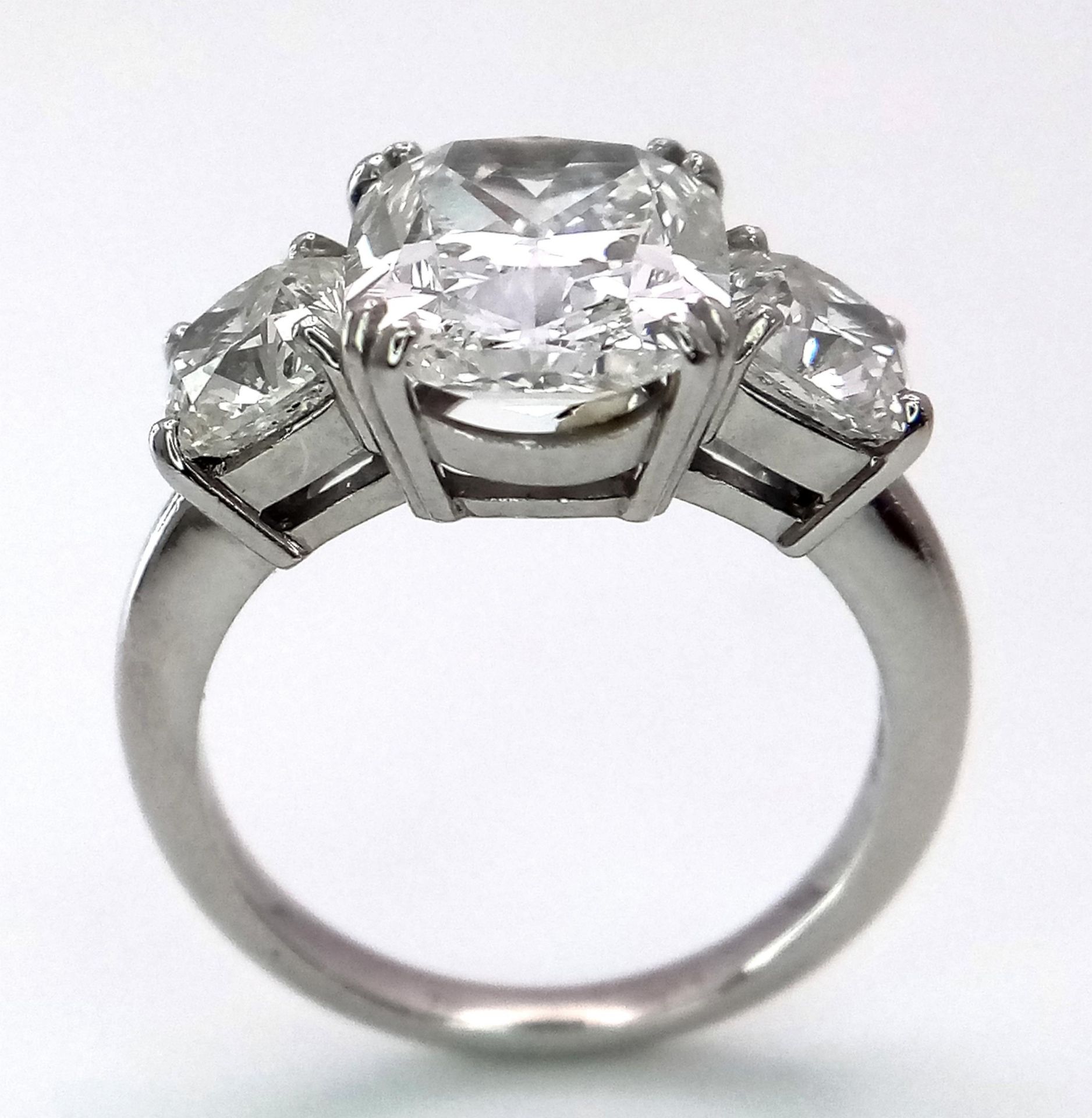 A Breathtaking 4.01ct GIA Certified Diamond Ring. A brilliant cushion cut 4.01ct central diamond - Image 3 of 22
