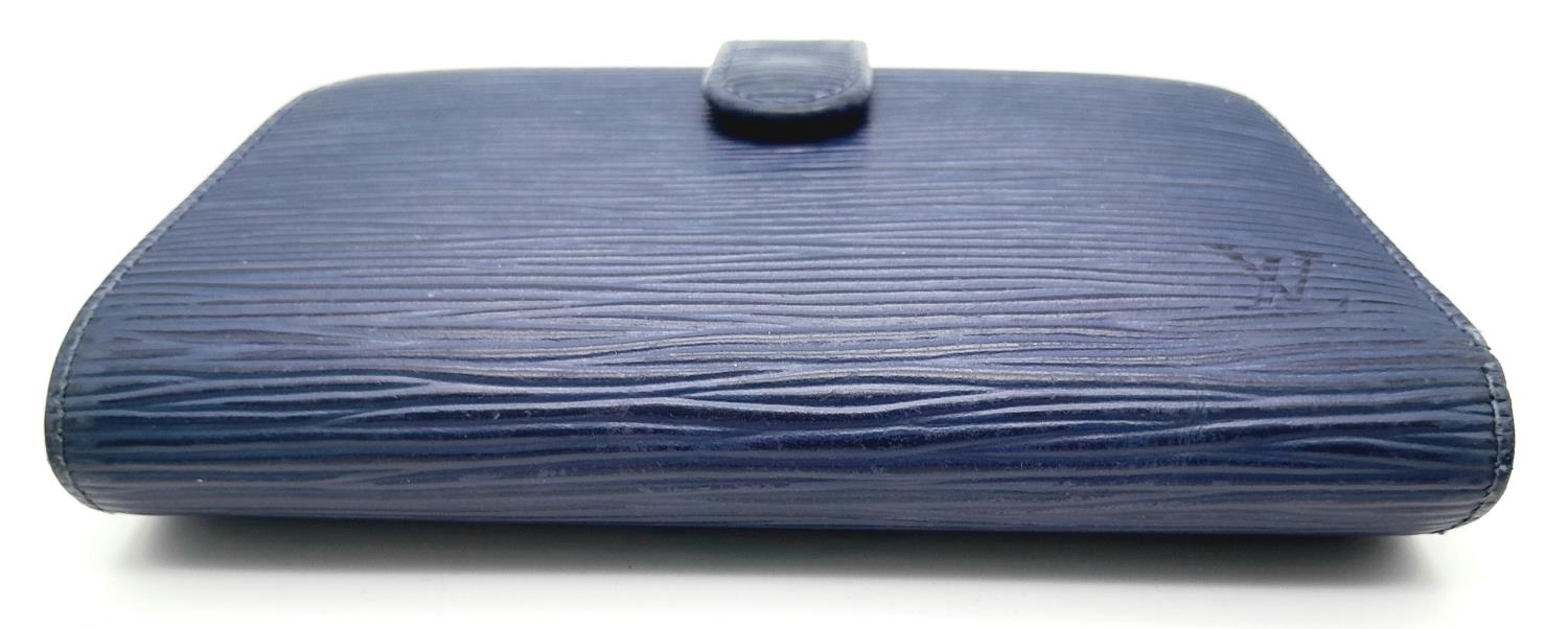 A Vintage Louis Vuitton Blue Bifold Wallet. Epi leather exterior with silver-toned hardware and - Image 6 of 17