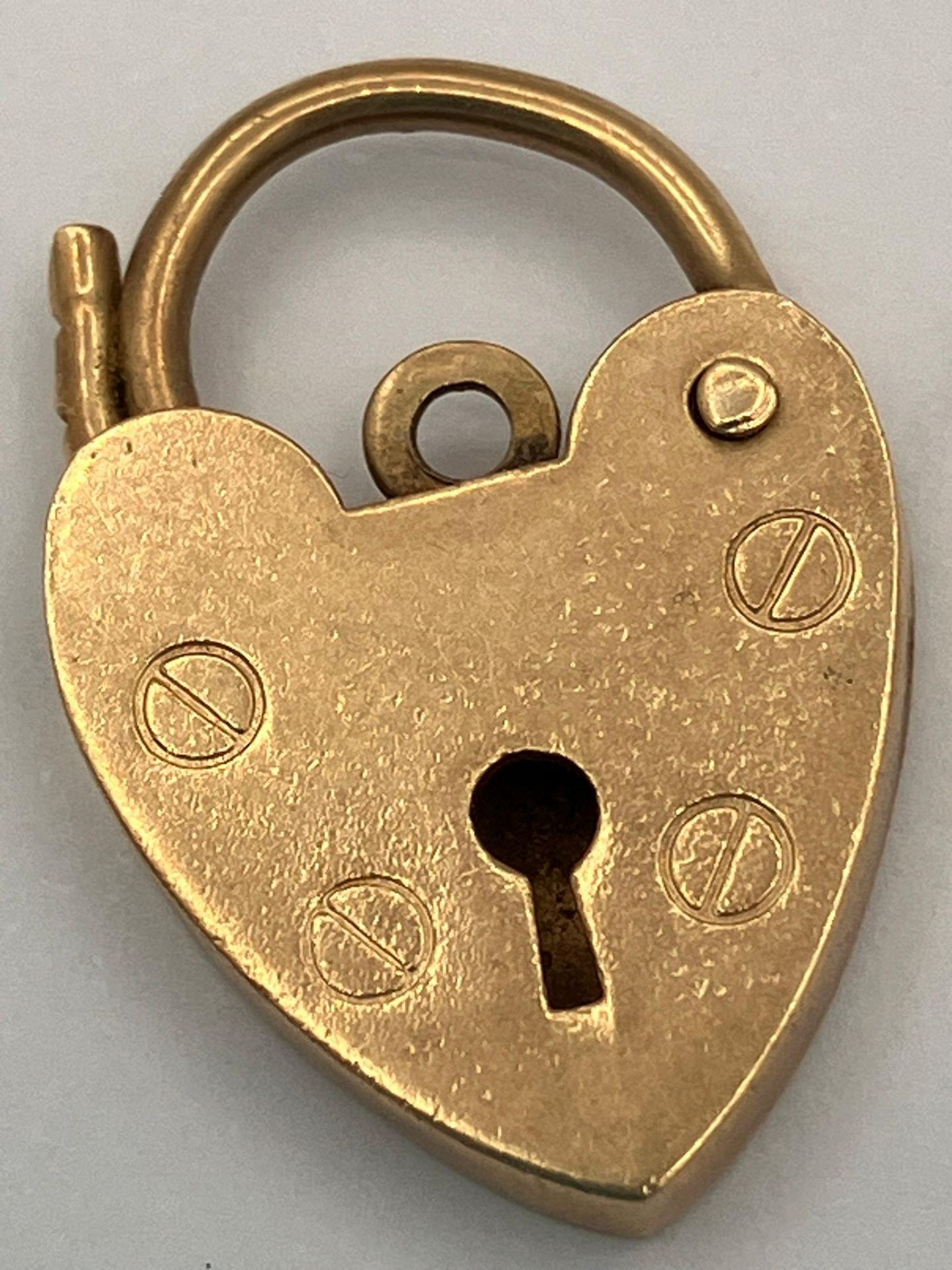 9 carat GOLD BRACELET LOCK/CHARM. Full UK Hallmark. 2.1 grams.