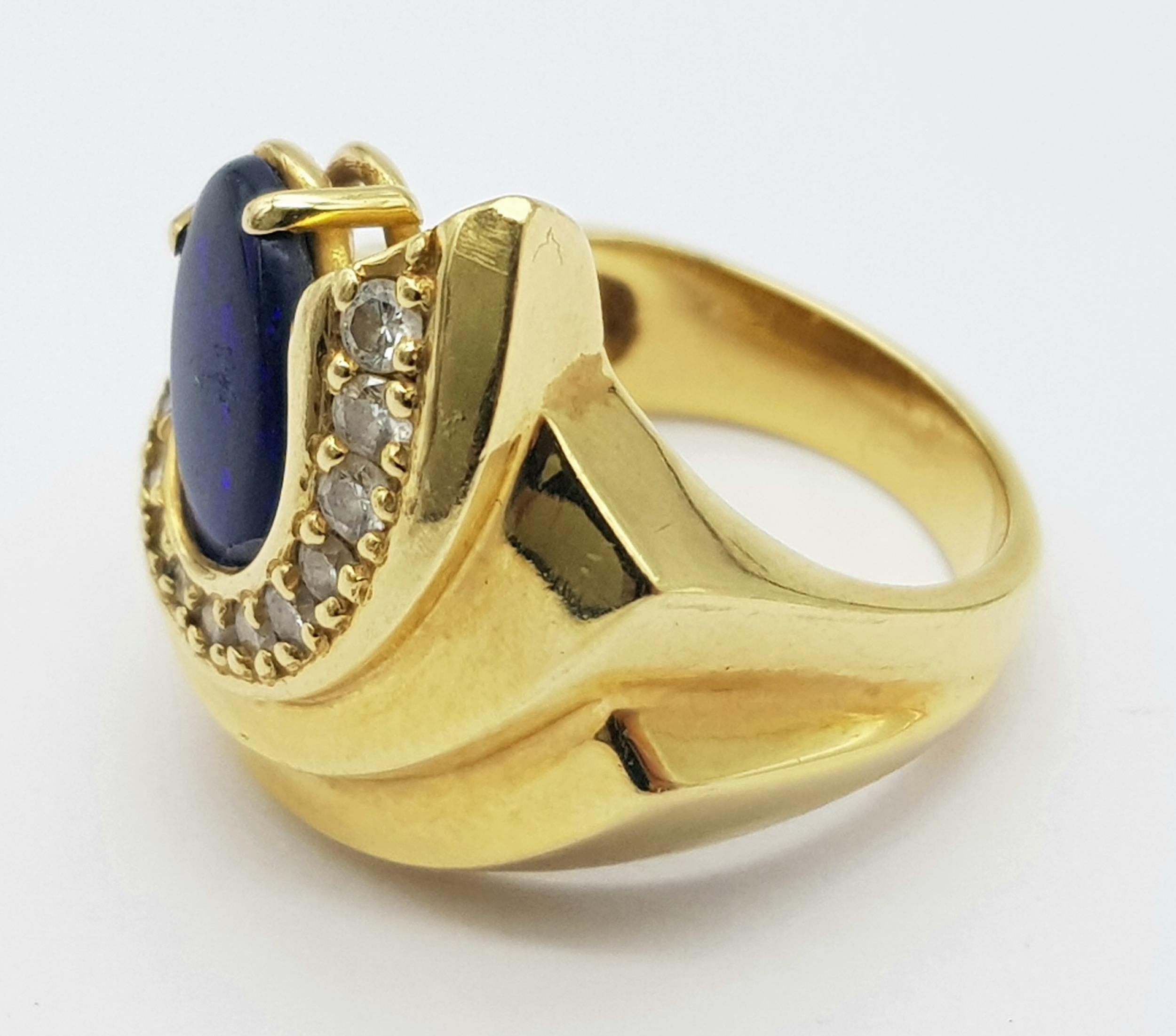A Gorgeous 18K Yellow Gold (tested) Australian Black Opal and Diamond Ring. An enticing oval cut - Image 5 of 6