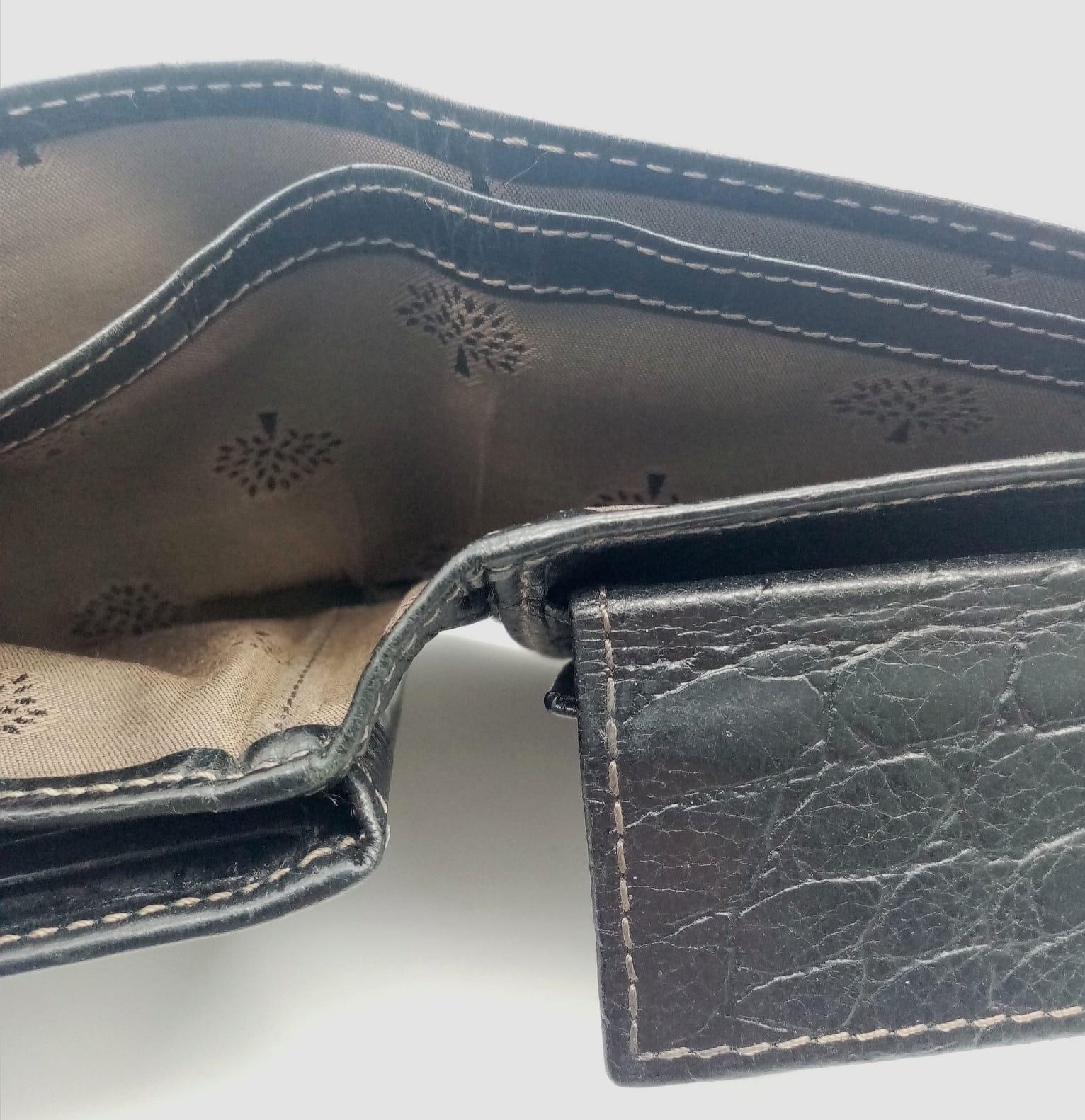 A black leather Mulberry wallet, can hold up to 8 cards, includes a coin pouch. Size approx. 11x9cm. - Image 5 of 6