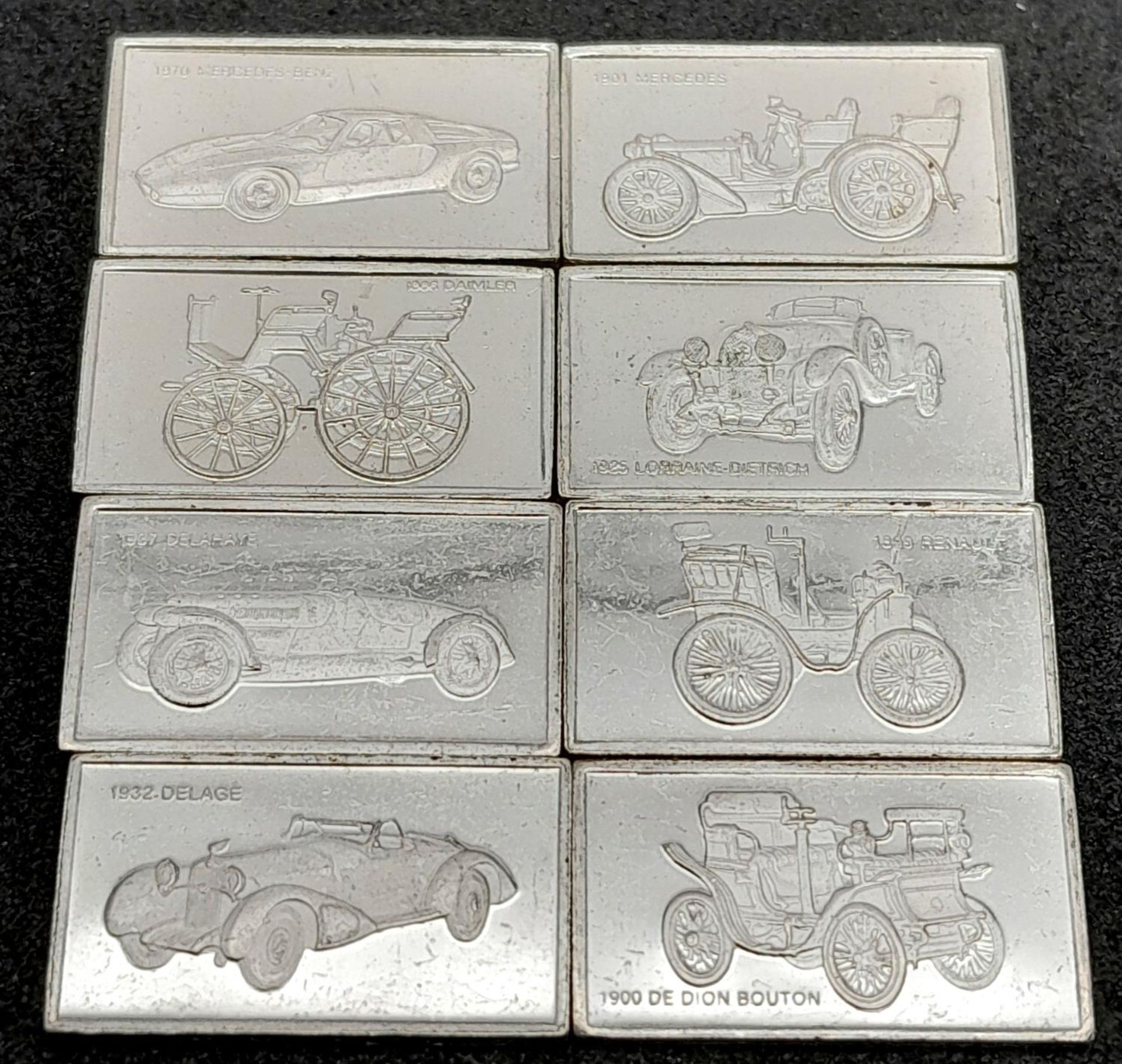 A SELECTION OF 8 STERLING SILVER EUROPEAN CAR MANUFACTURER PLAQUES DAIMLER, MERCEDES-BENZ, DE DION