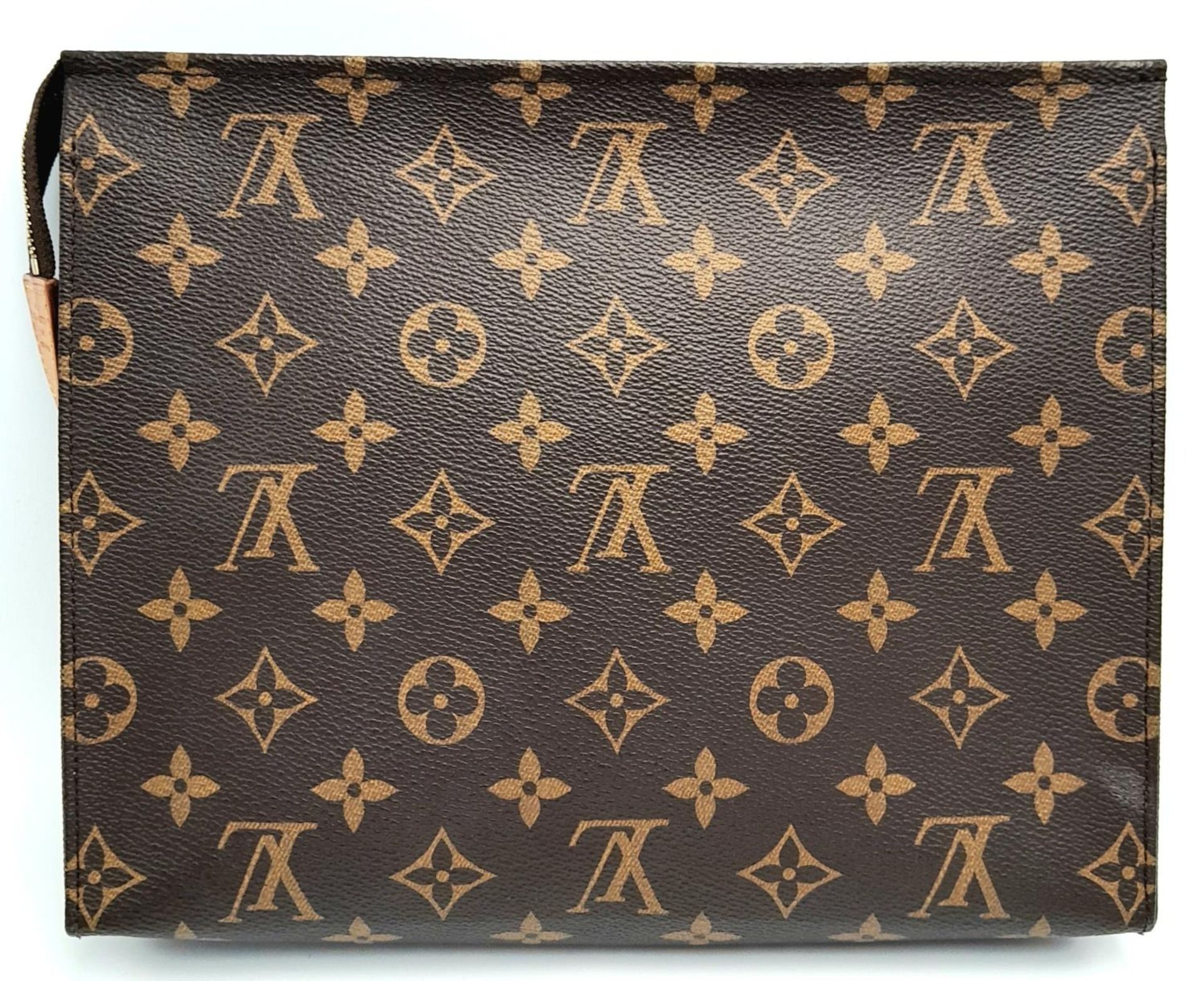 A Louis Vuitton Toiletries Pouch. Monogramed canvas exterior with gold-toned hardware and zipped top - Image 4 of 9