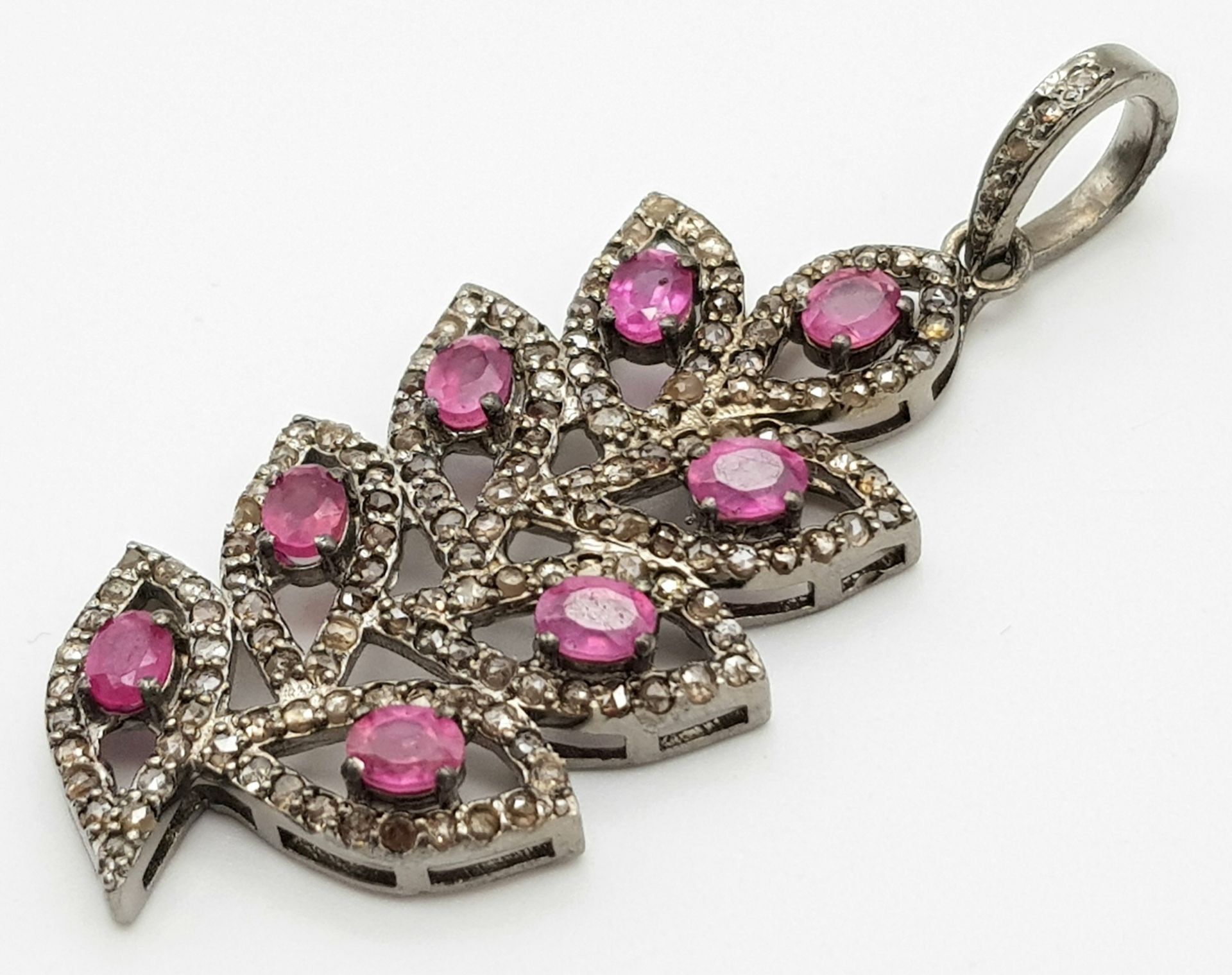 A Beautiful Ruby and Diamond Decorative Floral Pendant - with 1.90ctw of Rubies and 1.60ctw of