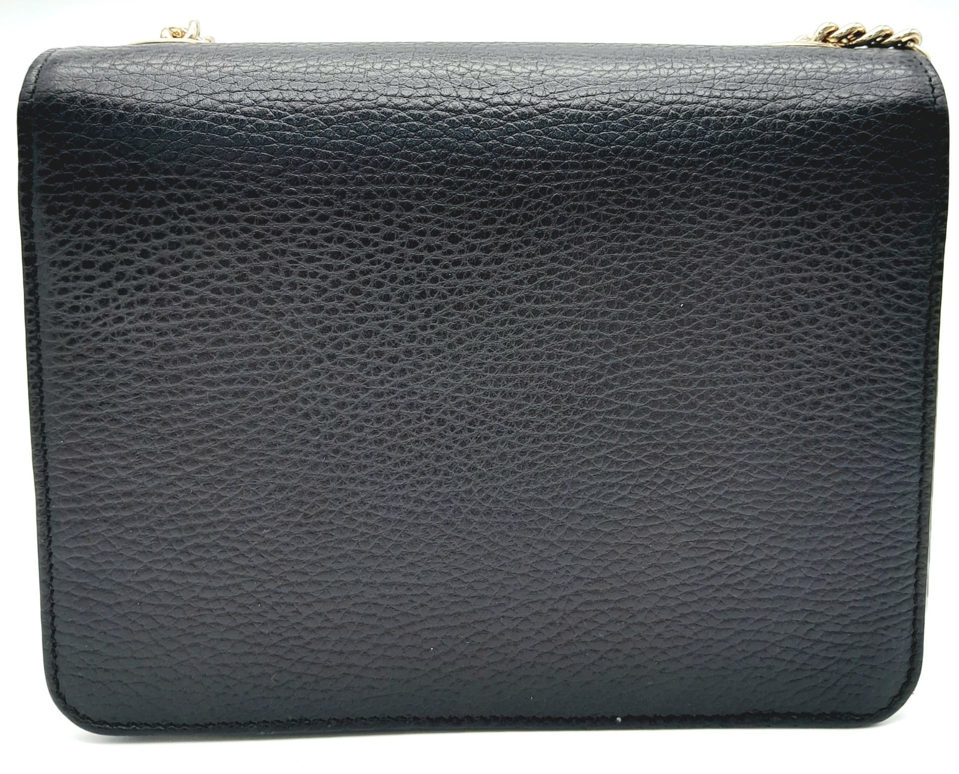 A Gucci Black GG Crossbody Bag. Leather exterior with gold-toned hardware, chain and leather - Bild 4 aus 11