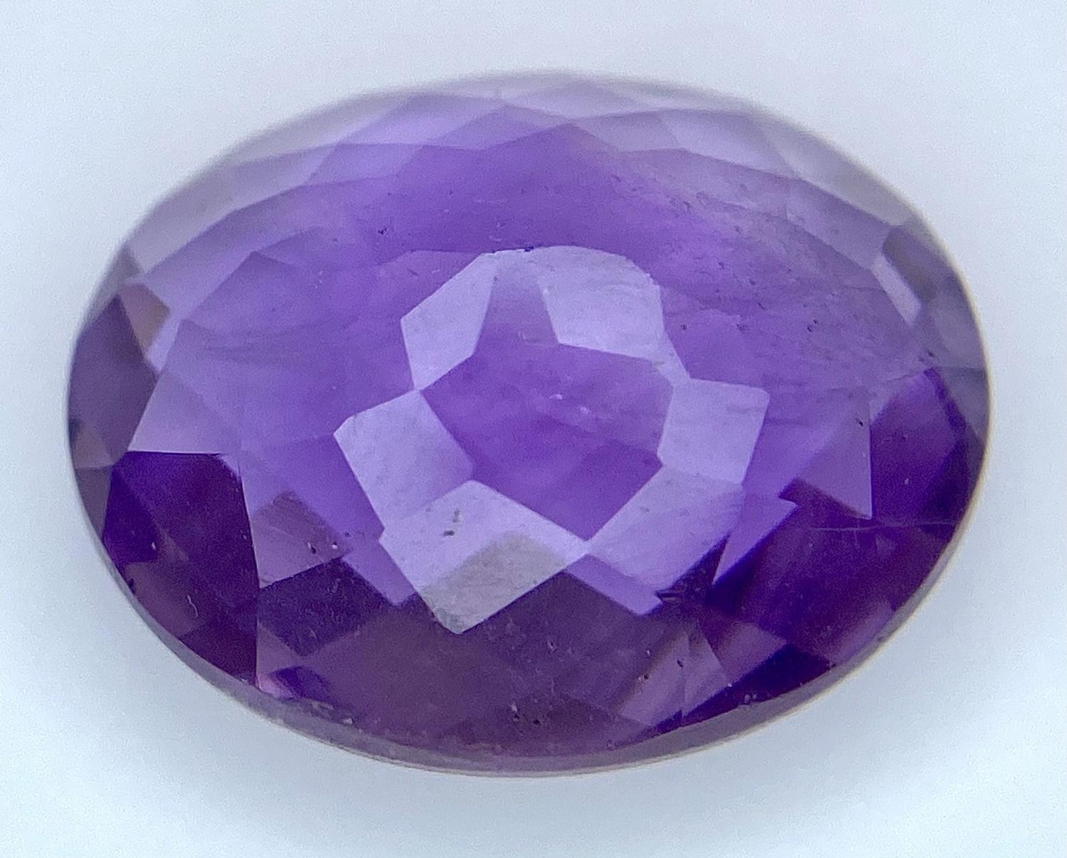 An 11.60ct Oval Faceted Amethyst - IDT Certified. - Image 3 of 5